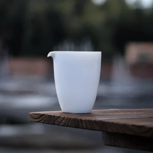 pure white ceramic gong dao bei fairness tea pitcher front view