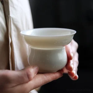 pure white porcelain tea strainer overall front view