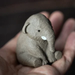 handcrafted purple clay elephant tea pet front view