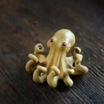 Handcrafted purple clay octopus tea pet front view