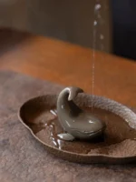 Handmade purple clay spraying whale tea pet full product view