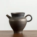 Rustic Iron Glazed Coarse Pottery Gong Dao Bei Style A handled fairness pitcher
