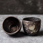 Set of 2 Chinese clay lotus relief tea cups vintage bronze glaze main view
