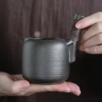 handmade side handle gong dao bei black pottery ceramic tea pitcher main view