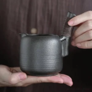 handmade side handle gong dao bei black pottery ceramic tea pitcher main view