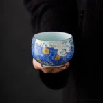 hand-painted starry sky chawan ceramic tea bowl with blue wave pattern and gold accents