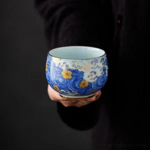 hand-painted starry sky chawan ceramic tea bowl with blue wave pattern and gold accents