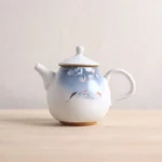 style a hand-painted 8.5 oz chinese ceramic teapot with traditional lotus and fish pattern