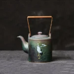 traditional chinese ceramic teapot with crane and cloud pattern copper handle