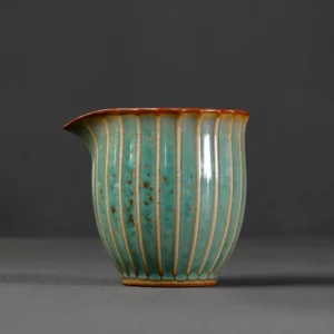 turquoise green jun kiln gong dao bei handmade ceramic tea pitcher main view