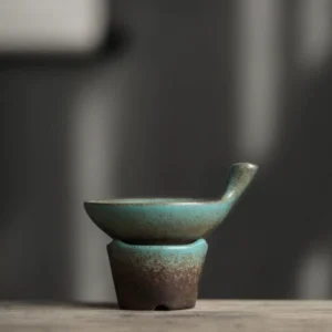 vintage blue green ceramic tea strainer with stand full product view