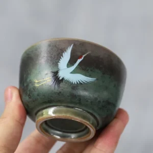 Vintage Chinese hand painted flying crane ceramic chawan tea cup side view
