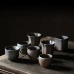 full collection display of vintage handcrafted chinese tea cup set with multiple unique shapes