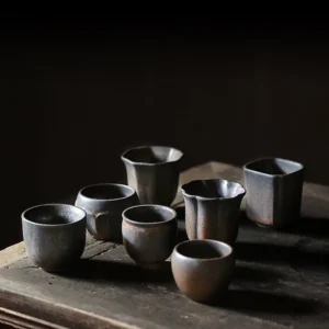full collection display of vintage handcrafted chinese tea cup set with multiple unique shapes