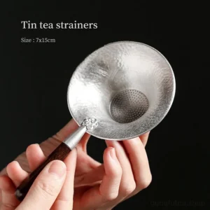 vintage hammered tin tea strainer spoon with dark wood handle