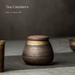 vintage handcrafted ceramic tea canister with wooden lid full view