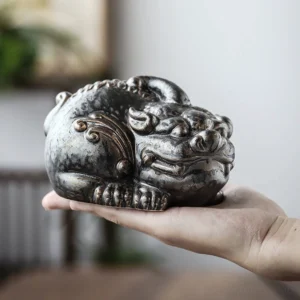 front view of vintage hand carved pixiu tea pet chinese auspicious tea table decor