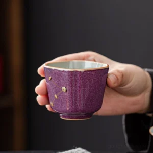 collection of vintage handcrafted purple glazed chinese tea cups with gold detailing