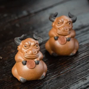 front view of handmade yixing zisha wealth-bringing bull tea pet