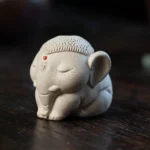 Handcrafted white lucky elephant purple clay tea pet side view