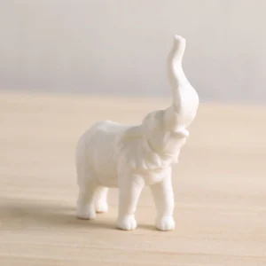 handcrafted white porcelain elephant tea pet style a raised trunk decorative tea companion