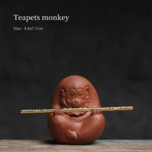 front view of handcrafted yixing purple clay monkey king tea pet