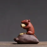 handmade yixing zisha fortune rat tea pet with golden ingot front view