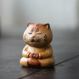 Zen meditating tiger ceramic tea pet front view